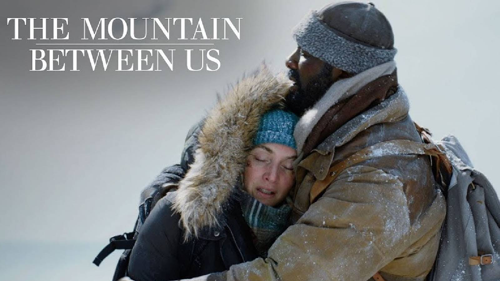 على خلفية رمادية يظهر البطل يحتض والبطلة وهما يواجهان البرد القارس والصلوج مرتين ملابس شتوية يغطيها الثلج  على الزاوية العليا من الصورة كتب اسم الفيلم 