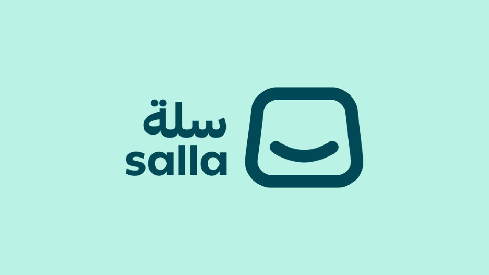 على خلفية خضراء فاتحة يظهر مربع بداخلI ابتسامة و كلمة سلة SALLA 